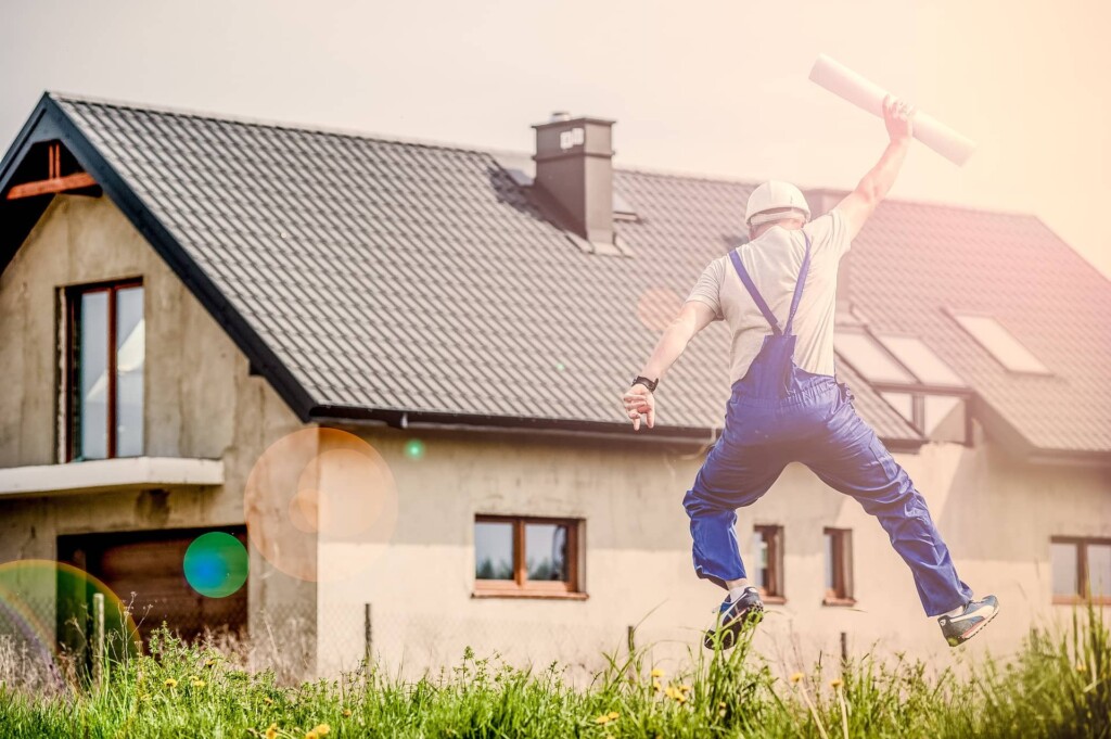 builder contractor jumping in air to celebrate SB 9 and 10 san francisco