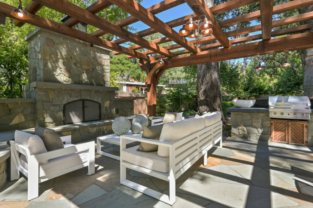 Outdoor fireplace living area with pergola at 10 Canyon Rd, Fairfax, listed by best San Francisco Realtors Danielle Lazier