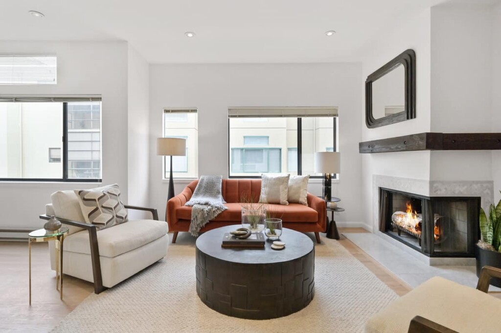 Condo interior with living area and fireplace for case study on buying a san francisco pied a terre