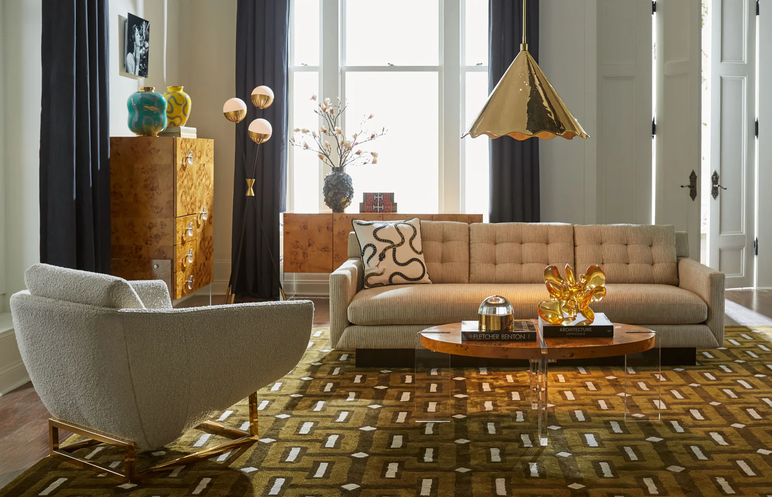 Modern Living Room Furnished by Jonathan Adler Furniture and Accessories including Sofa, Armchair, Rug, and Coffee Table