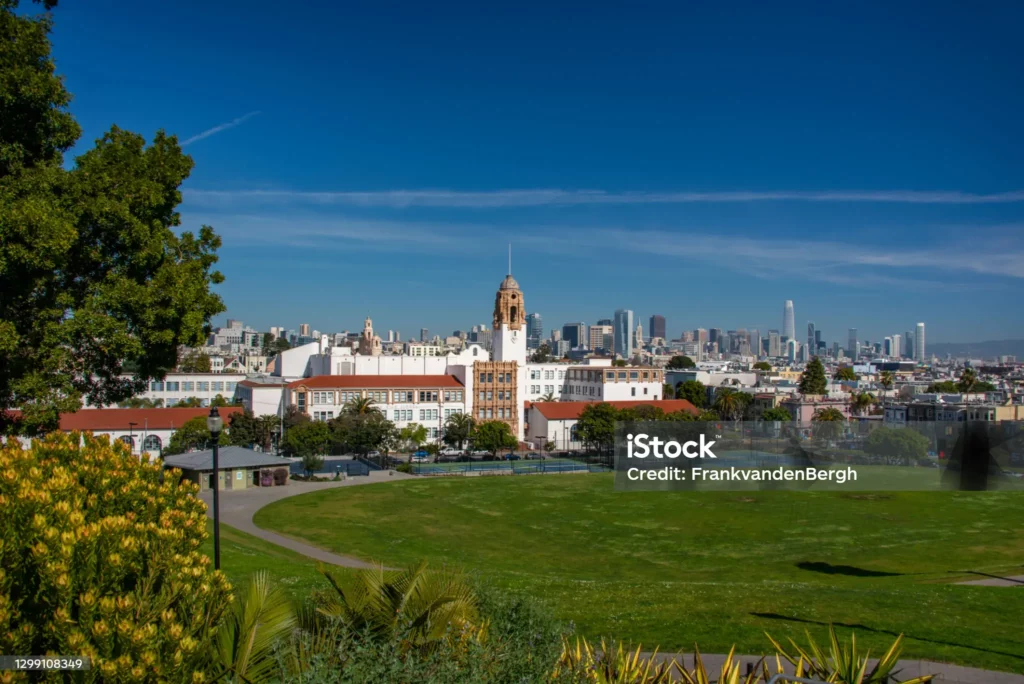 Open Green Space at Mission Dolores Park With Mission High School in Background