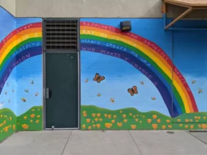Children’s Wall Art with Butterflies, A Rainbow, and Positive Words at Grattan Elementary School in San Francisco