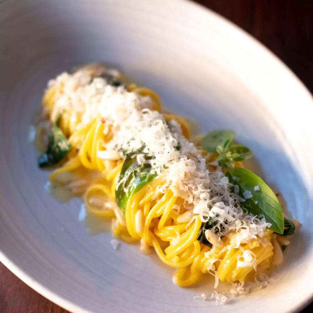 Homemade Pasta with Grated Parmesan Cheese at Upscale Italian Restaurant SPQR in Pacific Heights SF