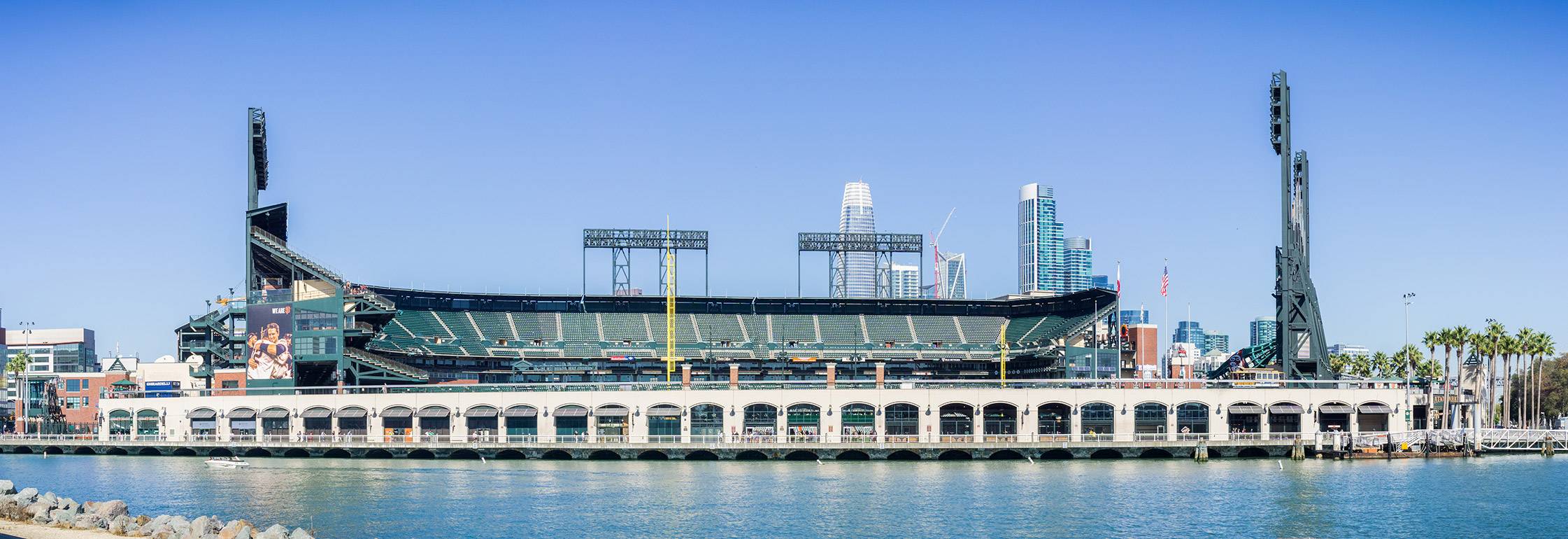 View of Oracle Park Stadium from the Bay with Highrises in the Background