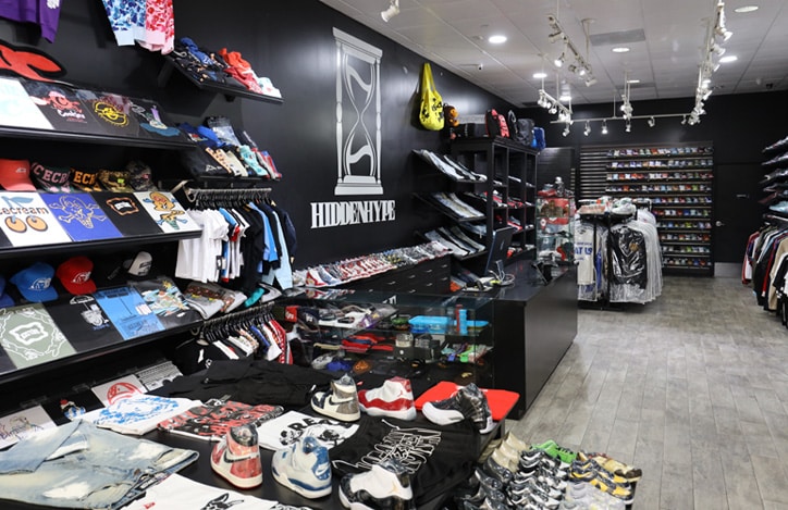 Interior of Hidden Hype store with unique men’s clothing and shoes displayed for sale