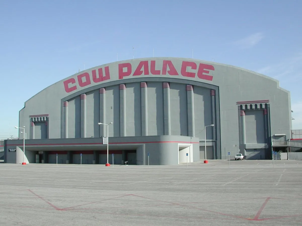 Street view of the Cow Palace Arena building and parking lot