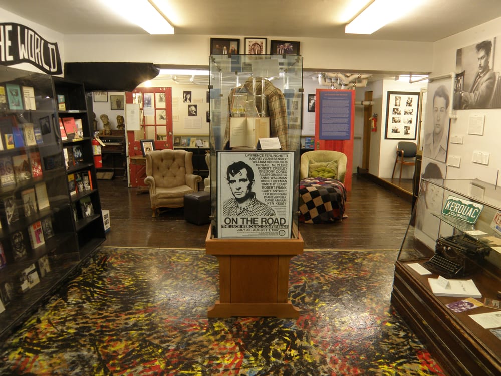 Inside of The Beat Museum featuring beat generation memorabilia including a Jack Kerouac ‘On The Road’ poster, old typewriter, and more historic odds and ends