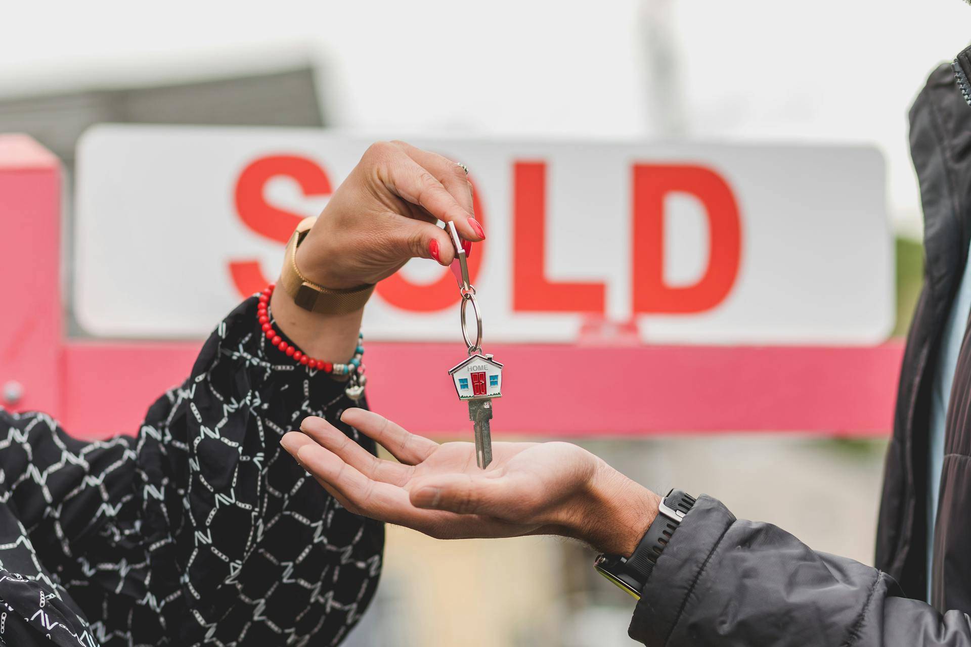 sold sign and handing the keys to homebuyer san francisco home sellers in 2025 MLS listing results data from top SF realtor and best real estate agents Danielle Lazier Vivre Real Estate